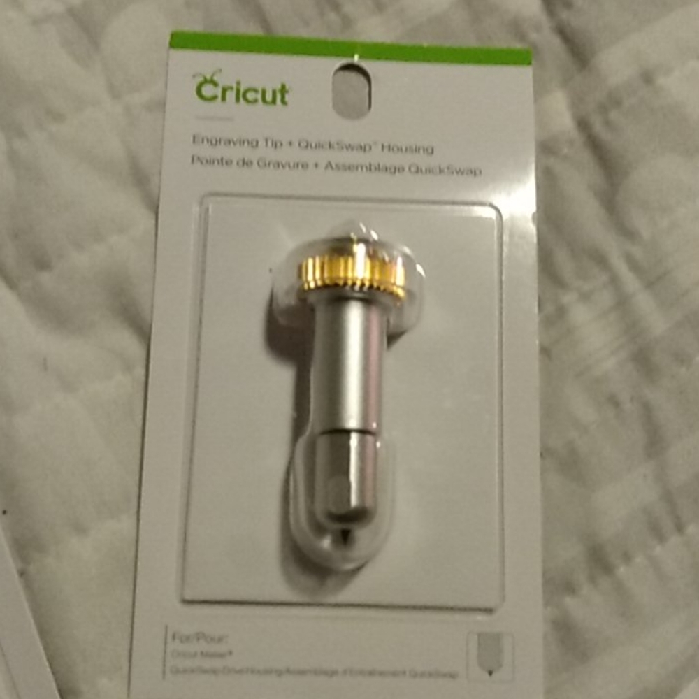 Cricut engraving tip and quick swap housing.